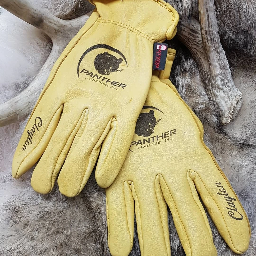 Yellow work gloves with branded markings