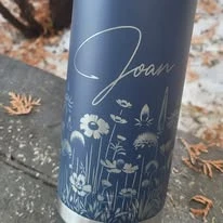 Dark Yeti mug with a name and floral engraving